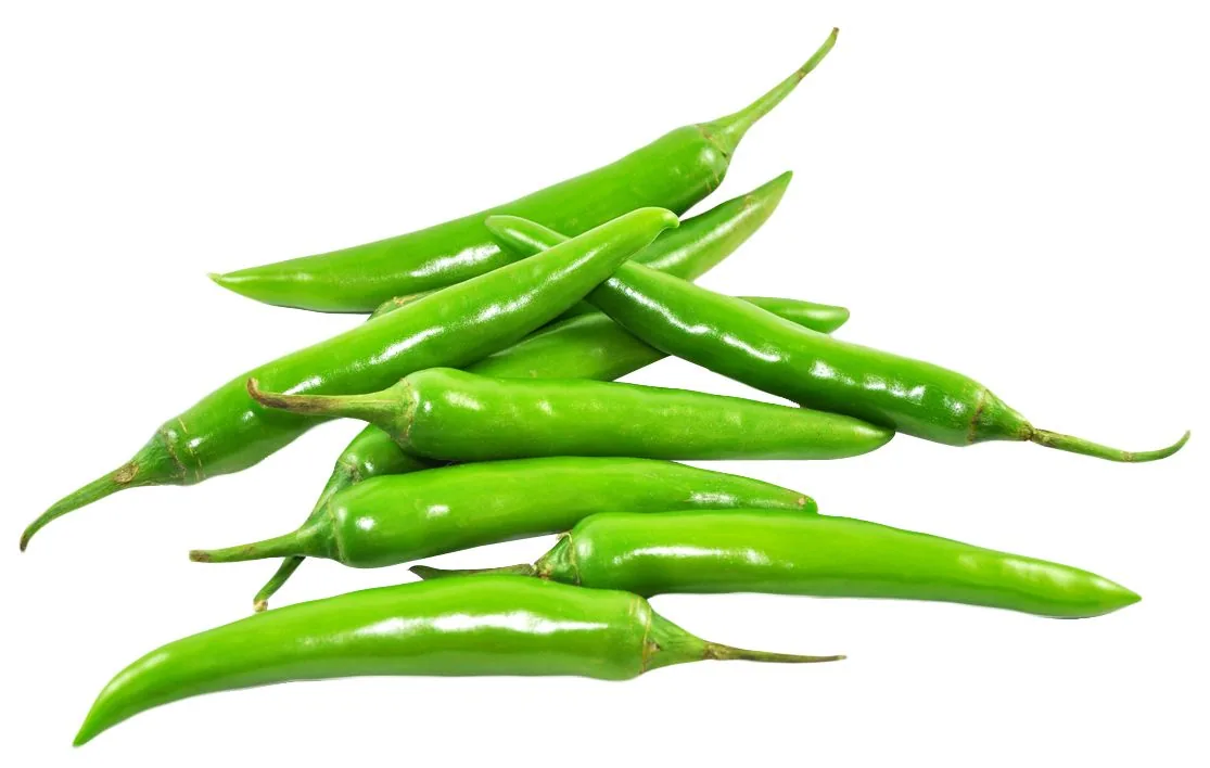 A pile of fresh green chillies