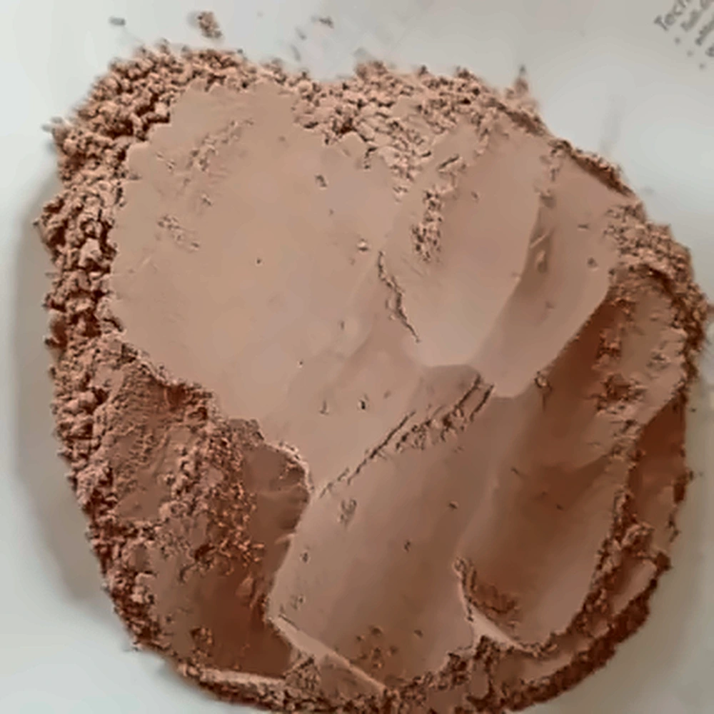 Dehydrated Pink Onion Powder in a wooden bowl