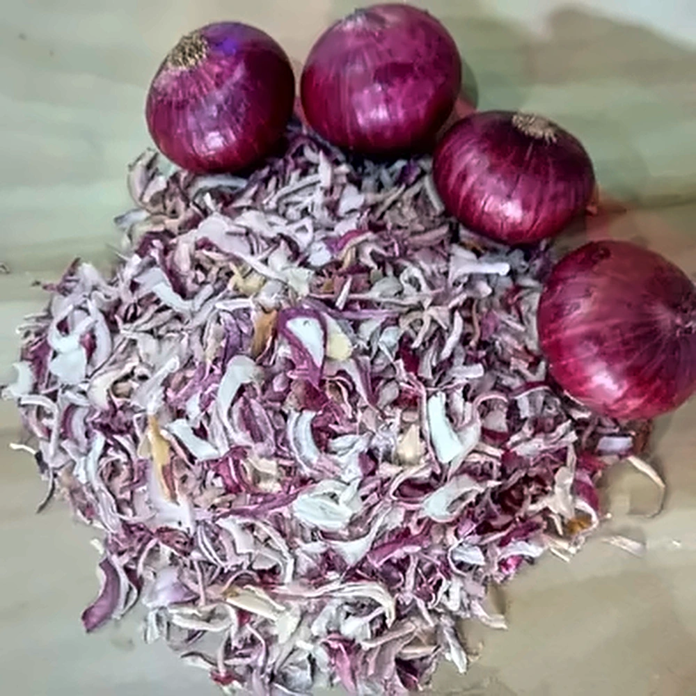 Dehydrated Red Onion Flakes in a wooden bowl